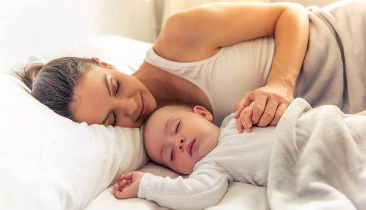Side,View,Of,Beautiful,Young,Mom,And,Her,Cute,Little