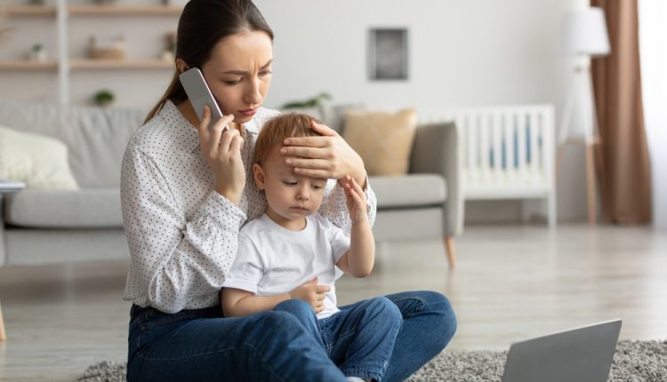Call,To,Pediatrician.,Stressed,Mother,Talking,To,Doctor,,Worried,About
