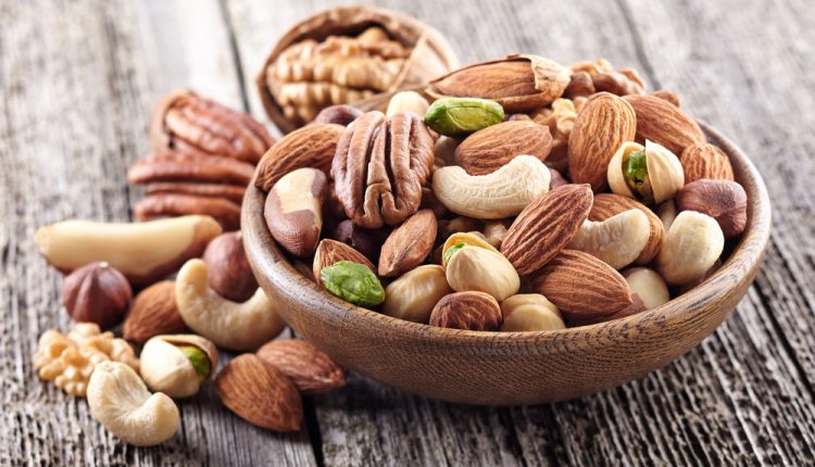Nuts,Mix,In,A,Wooden,Plate